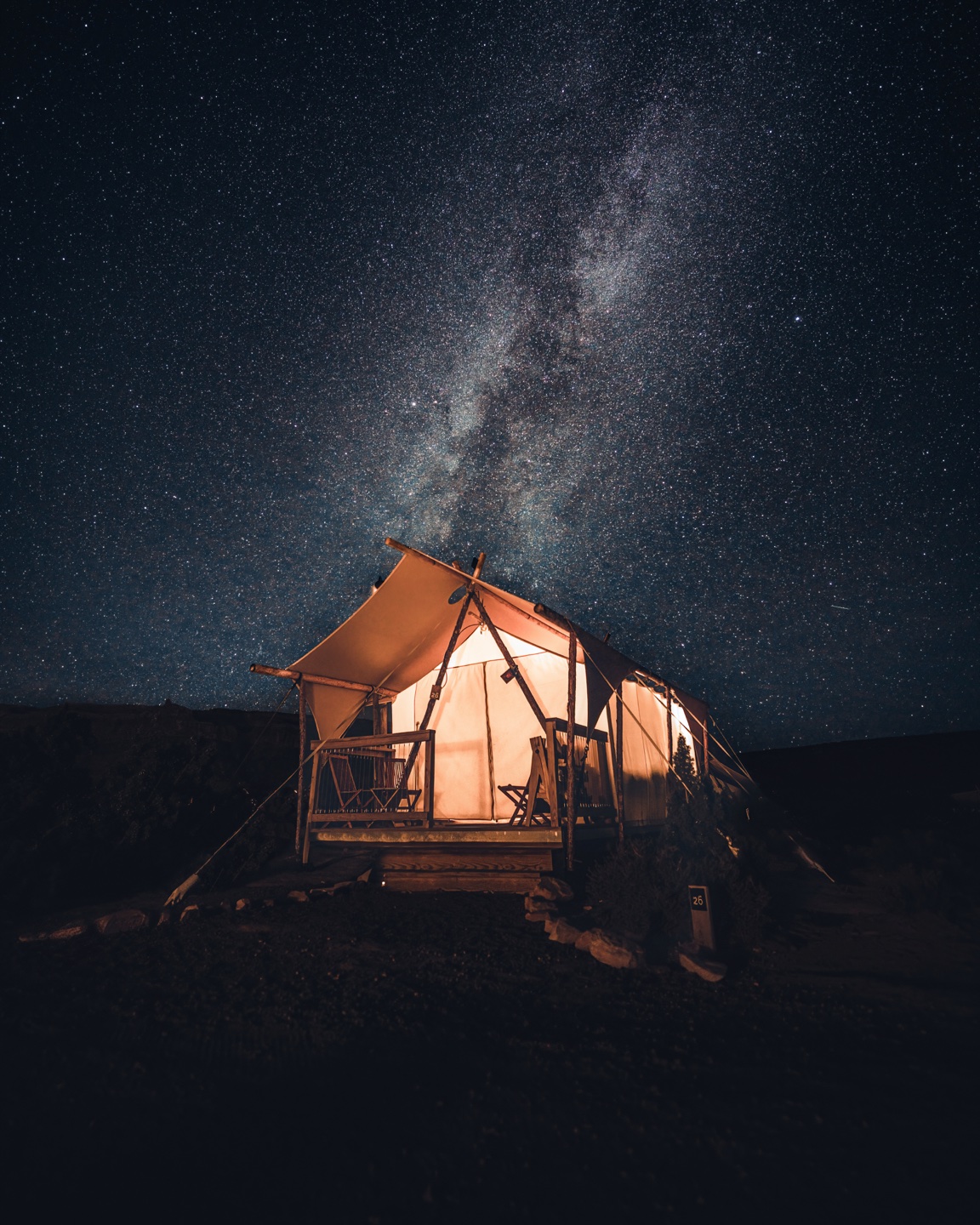 Under the Canvas glamping camp at desert dusk — destination partnership capture for resort and tourism work